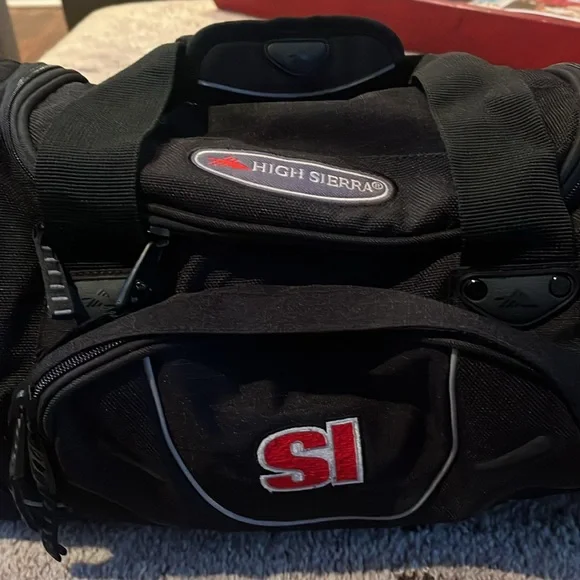High sierra sports illustrated small duffle bag with strap.New - black color